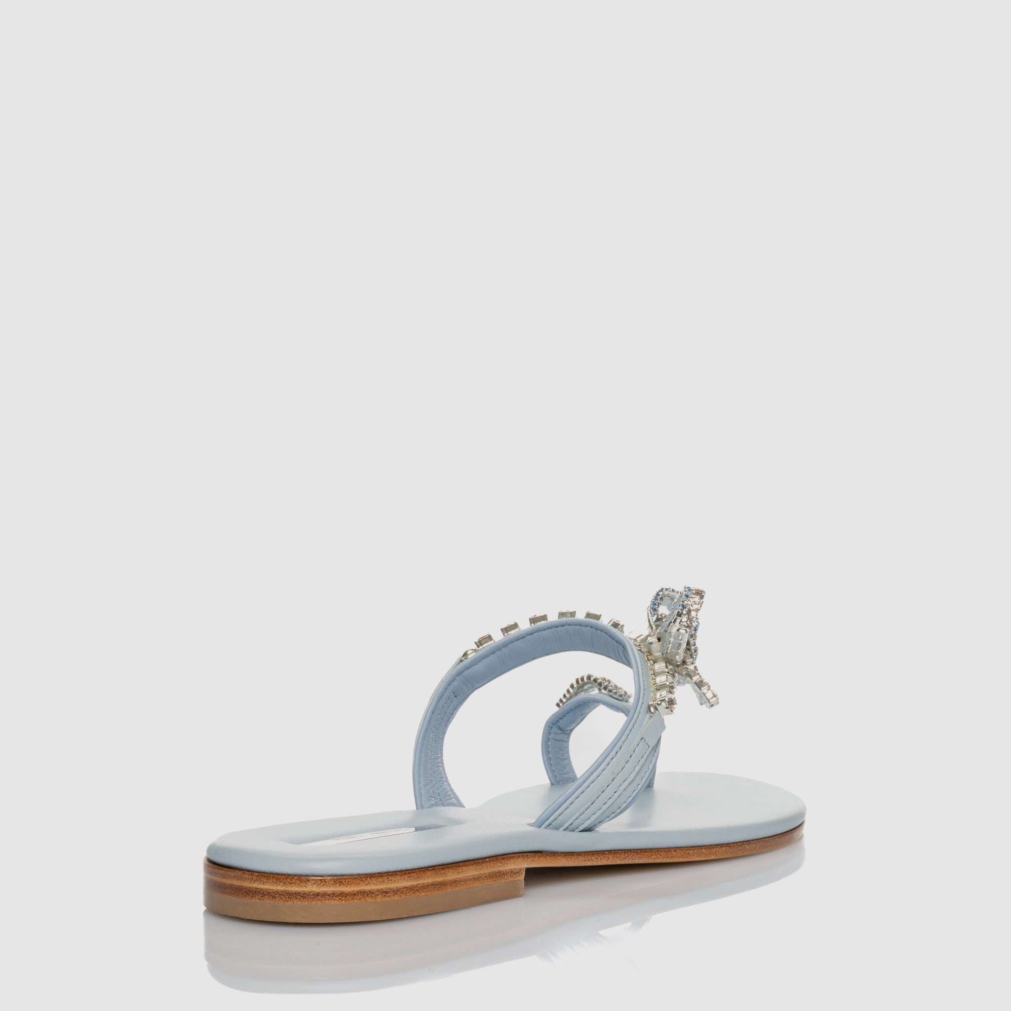 Bright Bow Light Blue sandal in Nappa leather with bow-themed crystals